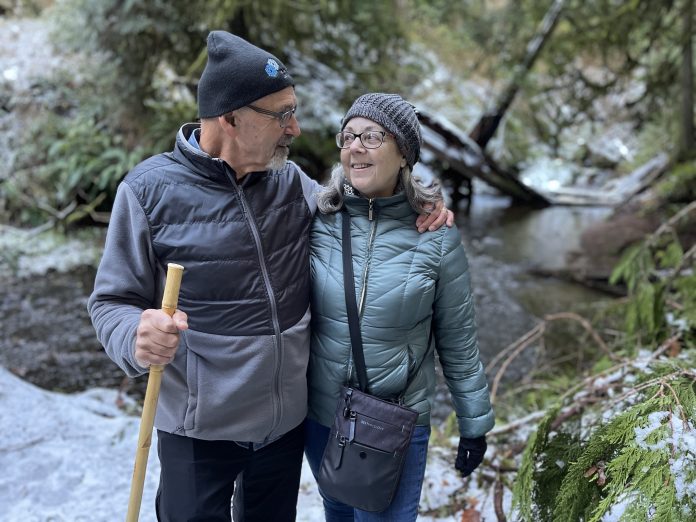 Winter On The Puget Sound Couple in Jefferson County Szue and Frank Juhasz hiking in the snow in the Olympic Peninsula