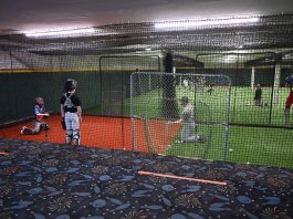 group of kids practicing baseball indoors at Multisport 360 in Montensano