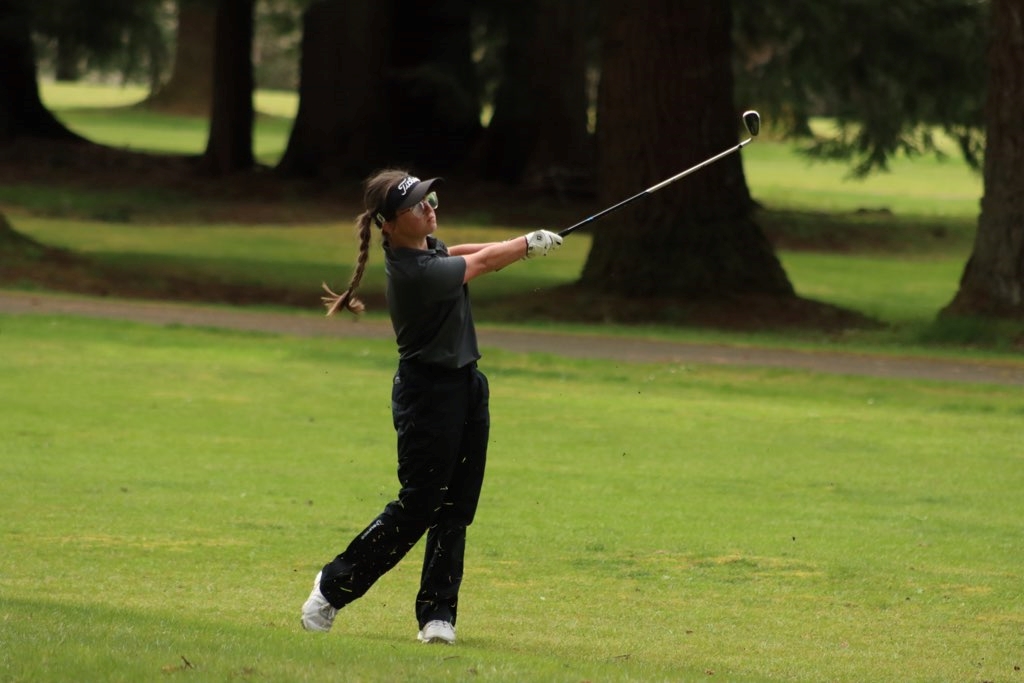 Hailey Blancas playing golf